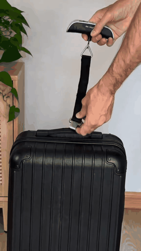 balanza-maletas-gif-3.gif